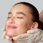 Calm girl receiving face massage